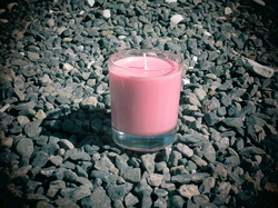 Pink candle in votive